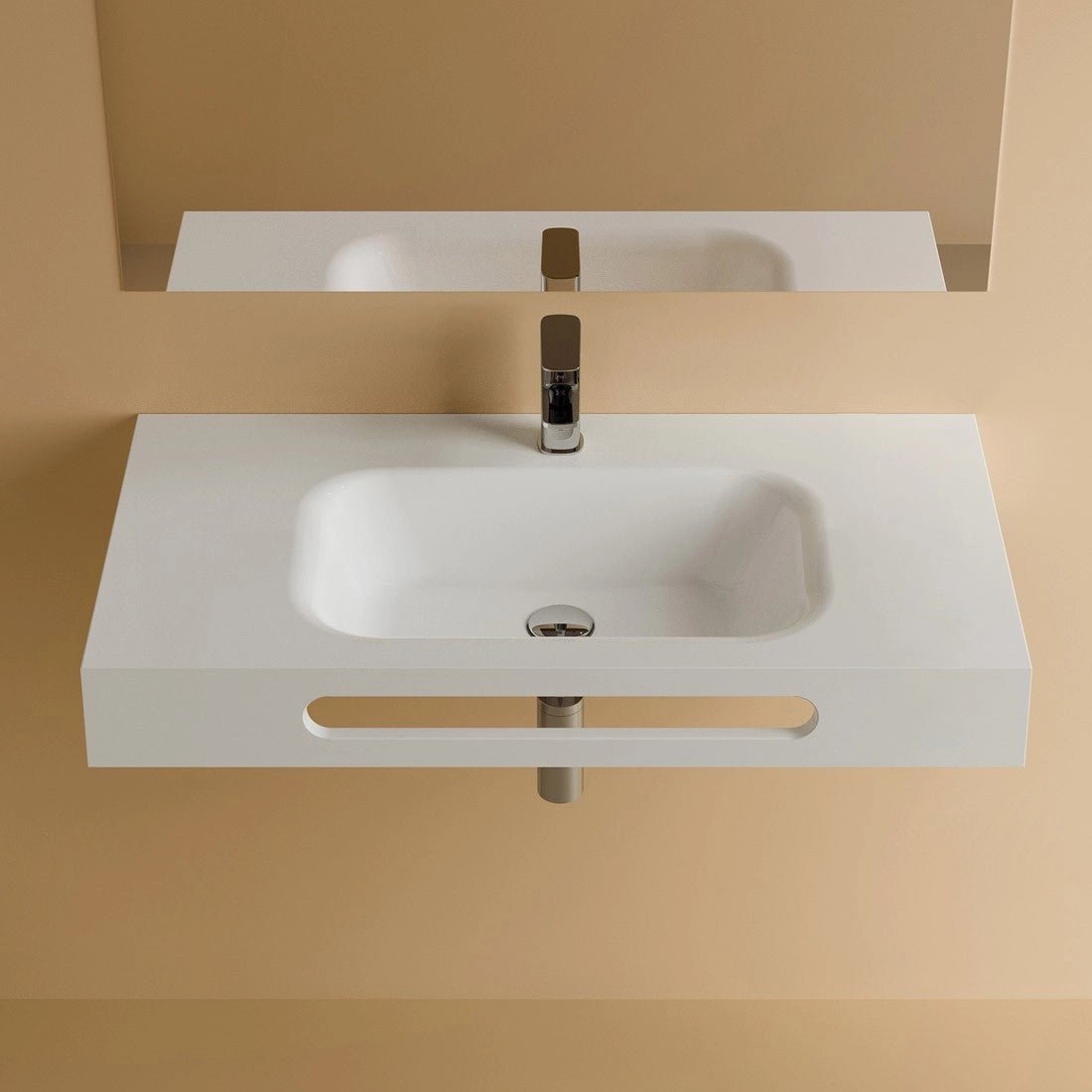 Lavabo suspendido con toallero